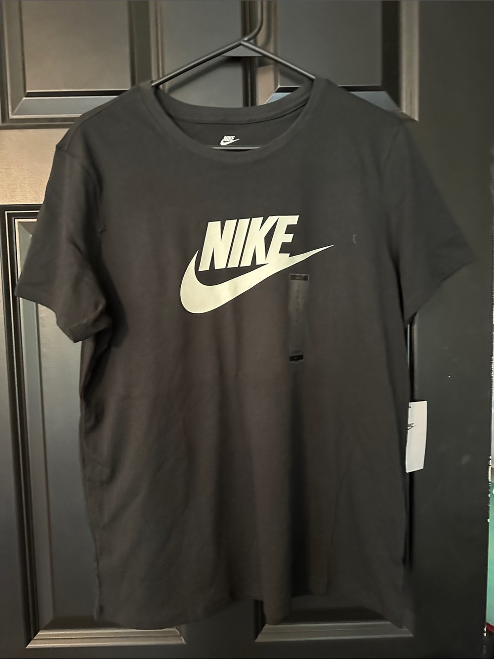 Nike Black T-Shirt with White Swoosh Logo
